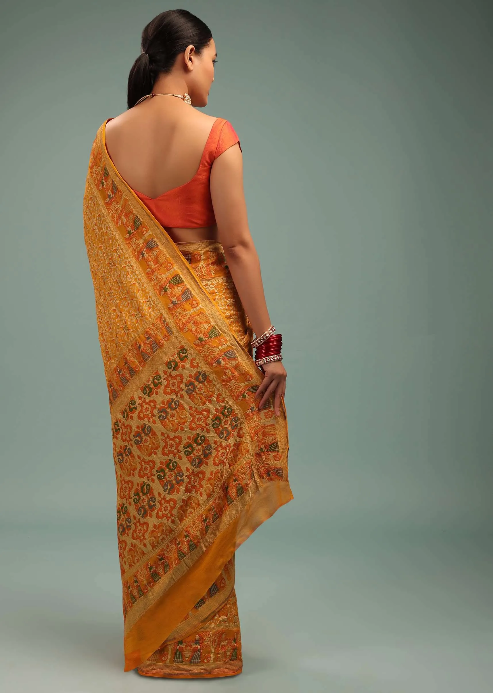 Amber Yellow Saree In Georgette With Bandhani Handwoven Figure Work