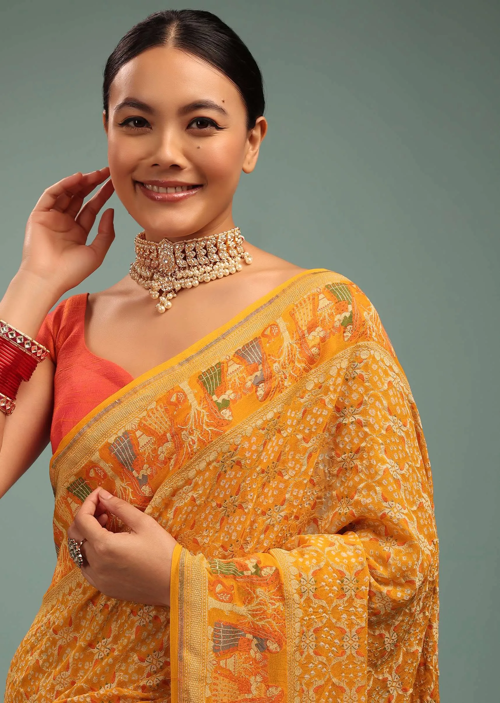 Amber Yellow Saree In Georgette With Bandhani Handwoven Figure Work