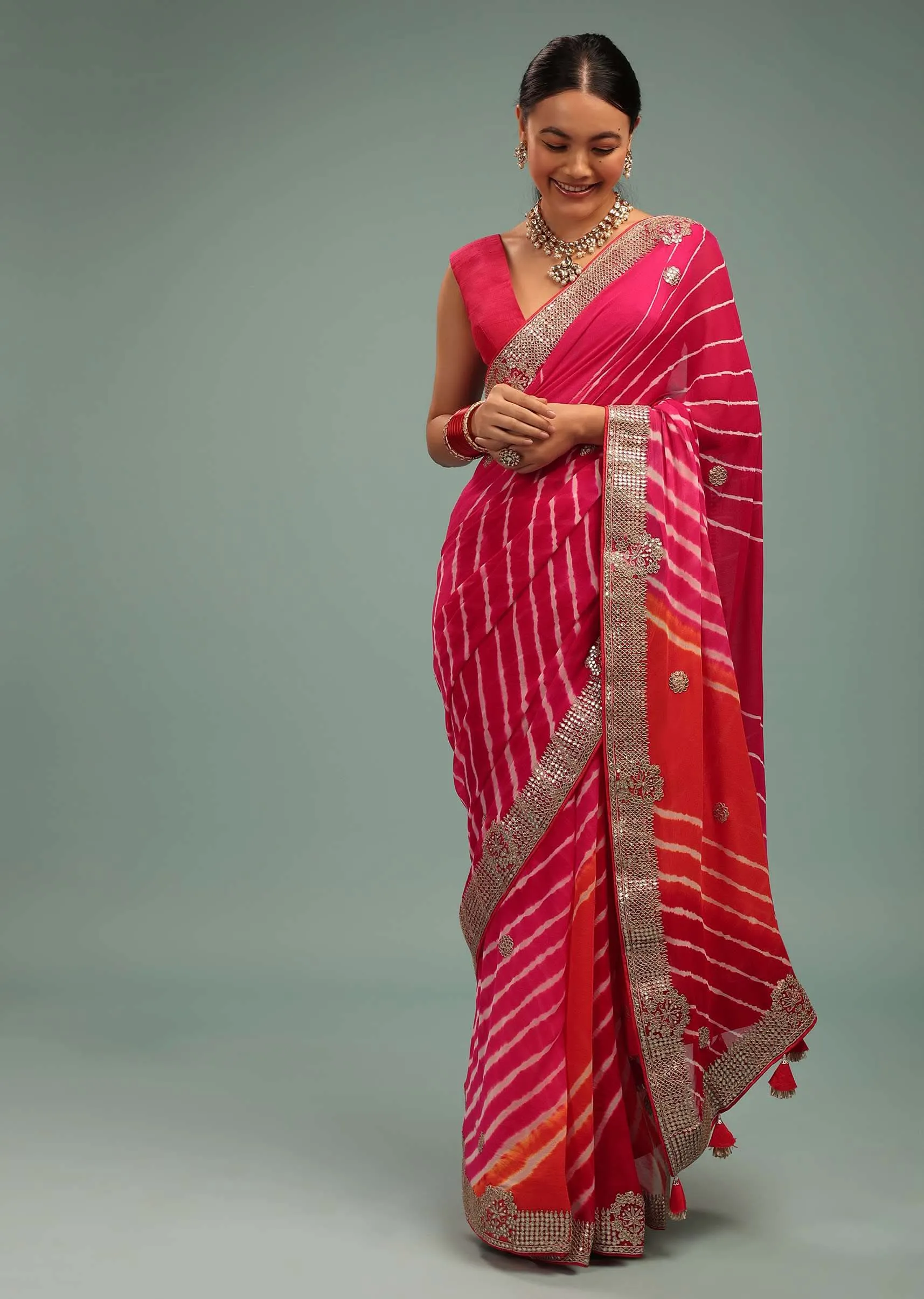 Gradient Red & Pink Leheriya Saree In Georgette With Jaipuri Gotta Work Border And Tassel Pallu